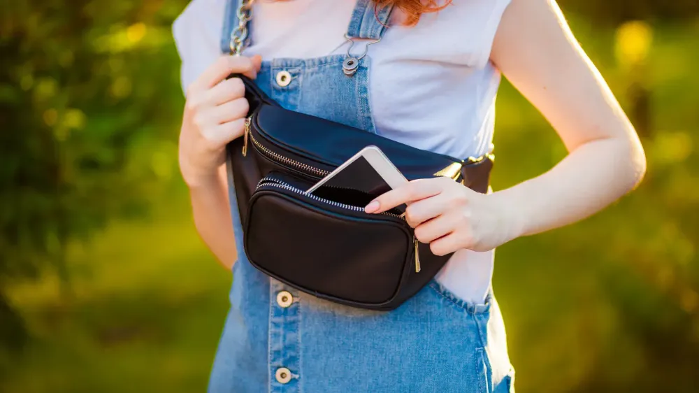 woman with a sling bag.
